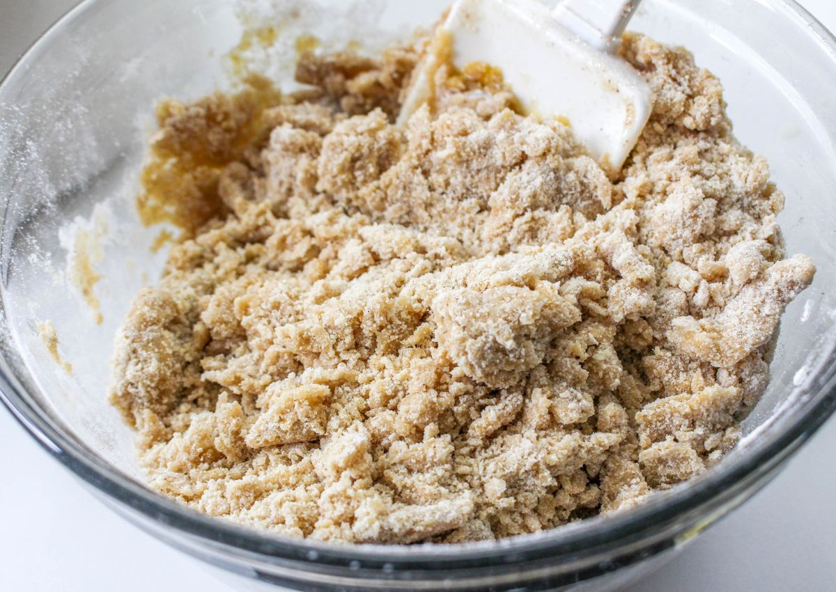 brown sugar, flour, melted butter, cinnamon and baking powder in a glass mixing bowl