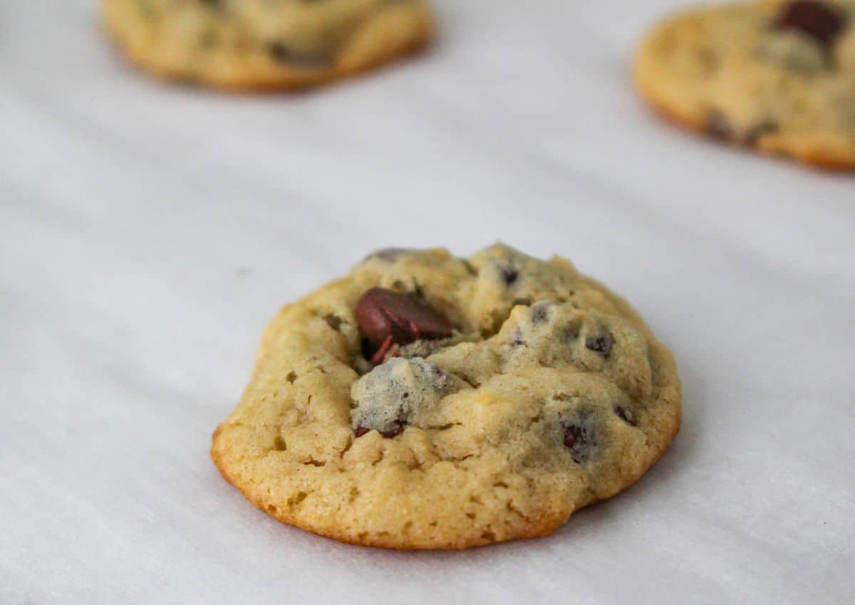 baked cookie on a parchment lined baking sheet