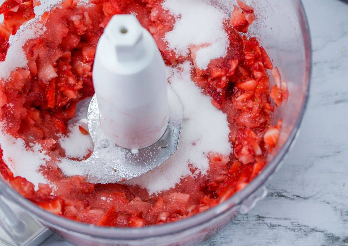 chopped strawberries and sugar in a food processor