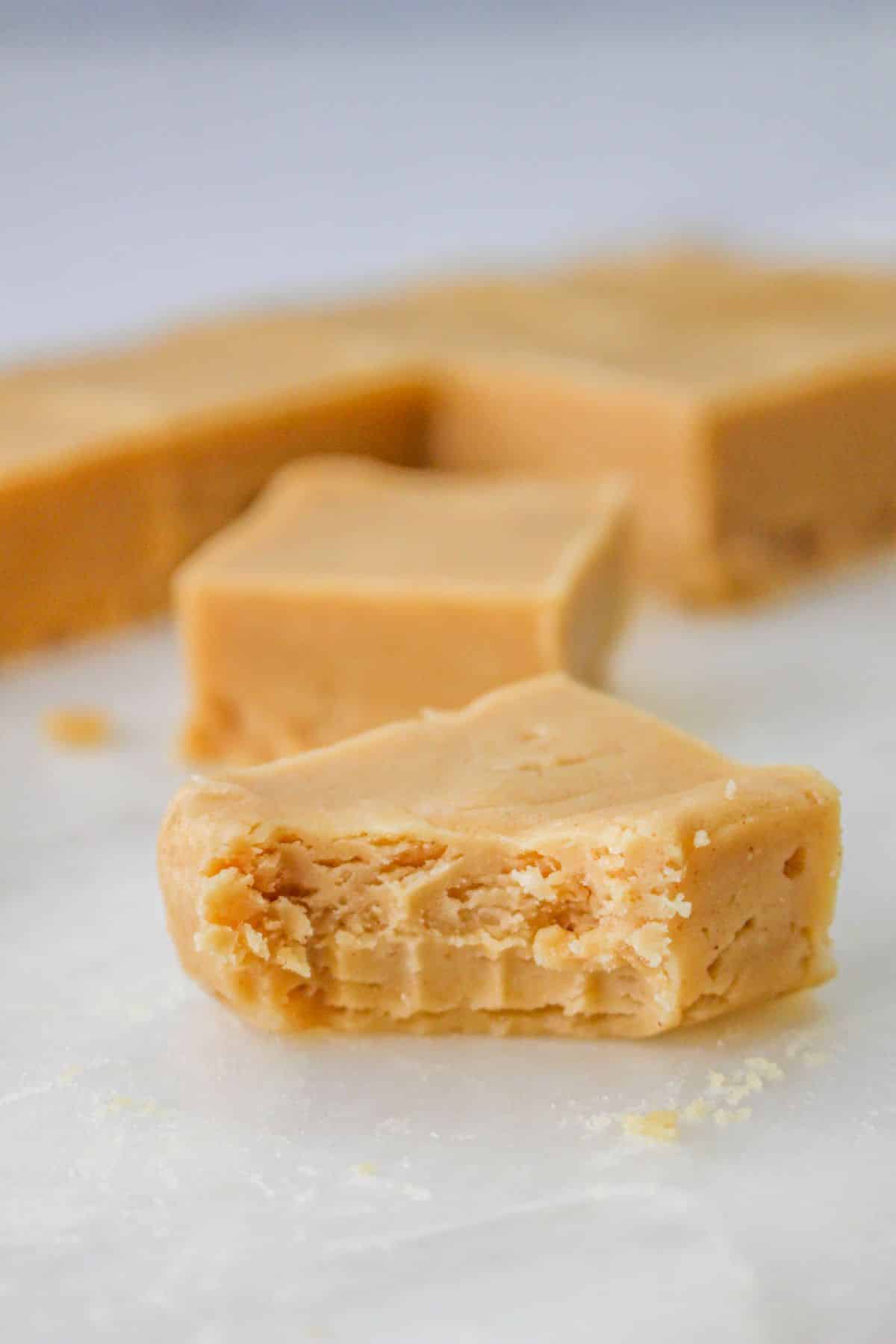 piece of peanut butter fudge with a bite missing