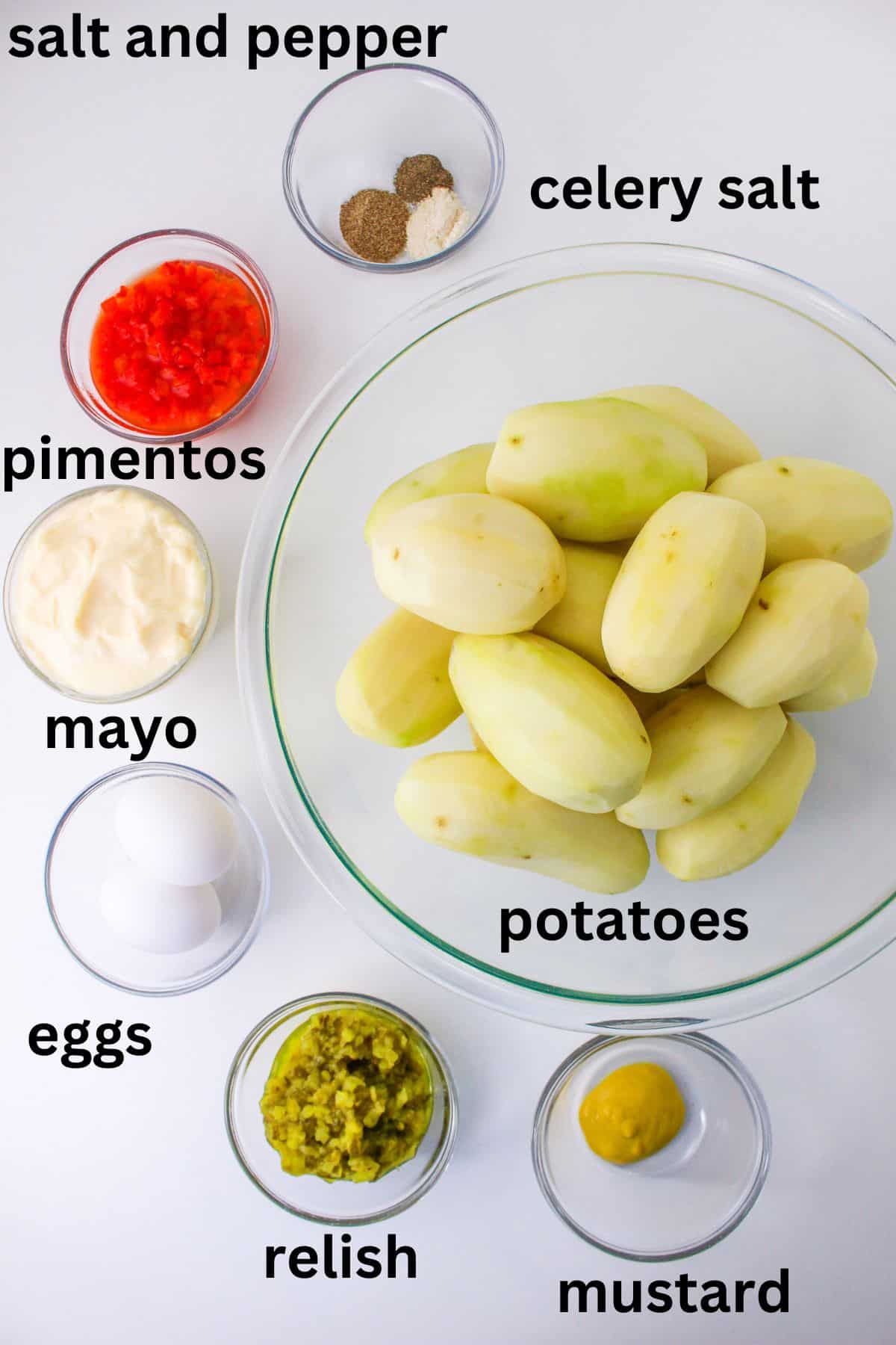 salt, papper, celery salt, pimentos, mayo, eggs, relish. mustard, and potatoes