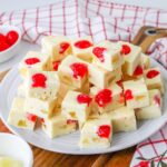 white plate stacked with pineapple upside down fudge