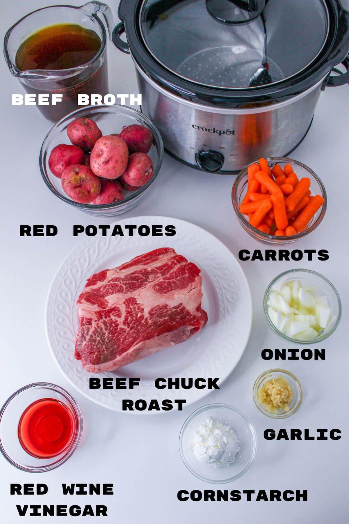 bowls of beef broth, red potatoes, carrots, beef chuck roast, diced onions, garlic, cornstarch, red wine vinegar.