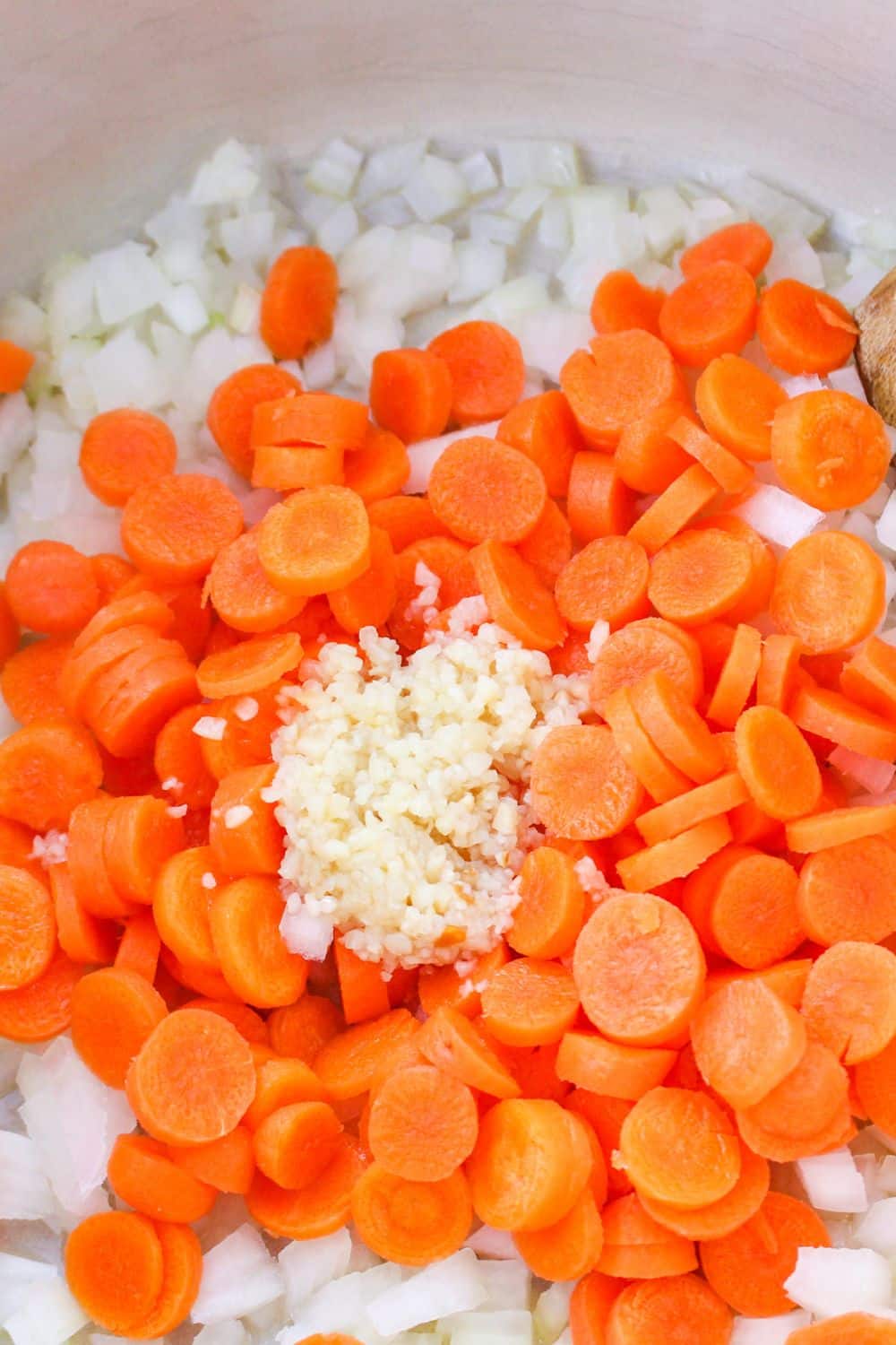 diced onion, carrot and garlic in a stockpot