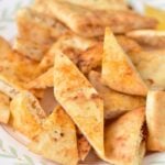 air fryer pita chips on a plate.