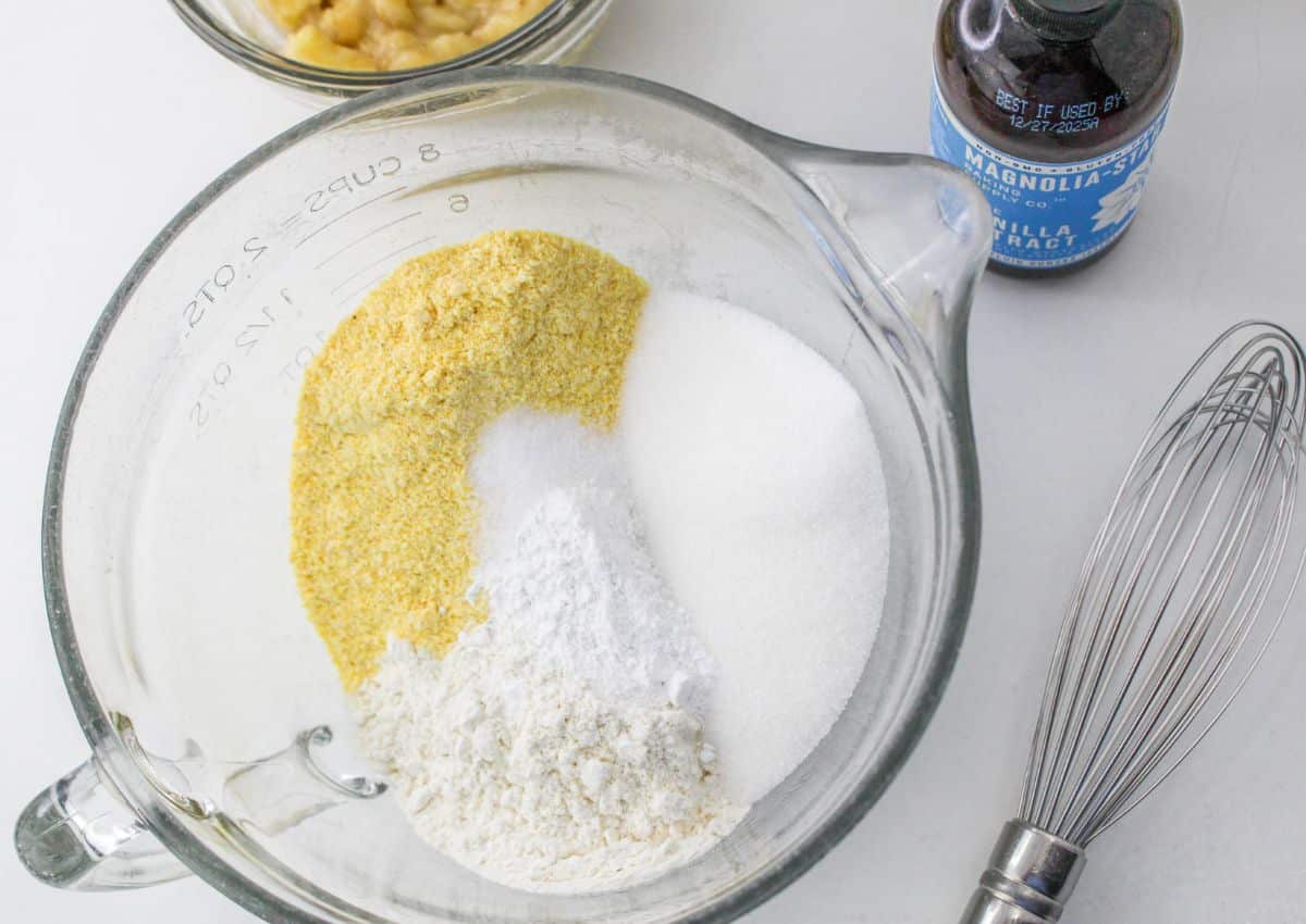 flour, salt, sugar, and cornmeal in a large glass mixing bowl.