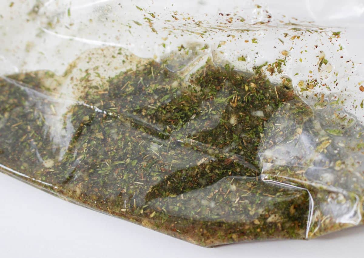 marinade being mixed in a gallon sized ziploc bag.