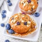 banana blueberry oatmeal muffins on at platter.