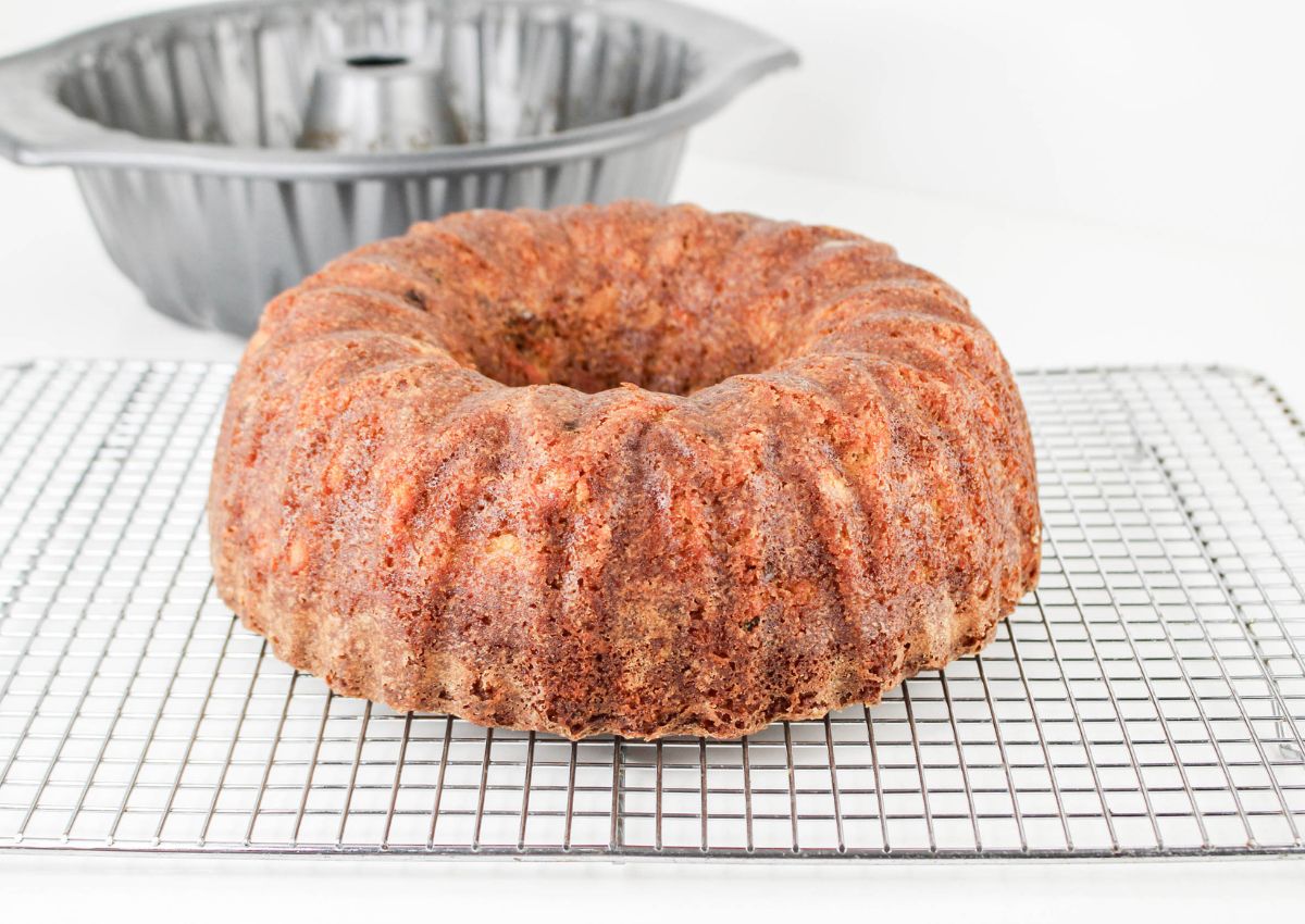 carrot cake bundt cake cooling on a wire rack.