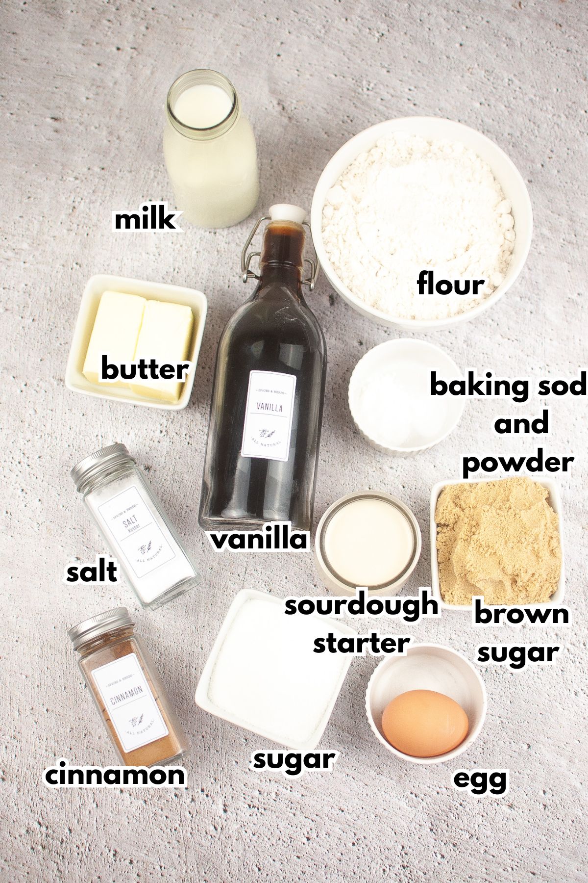 ingredients needed to make sourdough cinnamon muffin on a counter.
