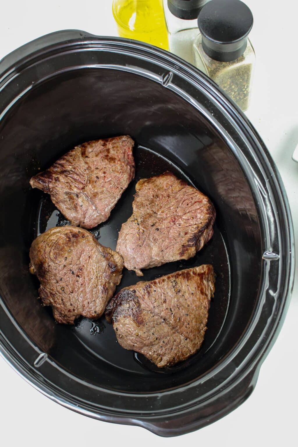 Slow Cooker Braised Steak and Onions - Mama's On A Budget