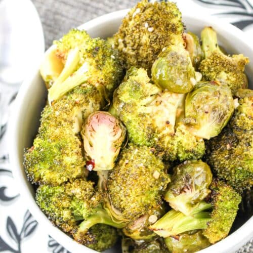 roasted broccoli and brussels sprouts in a bowl.