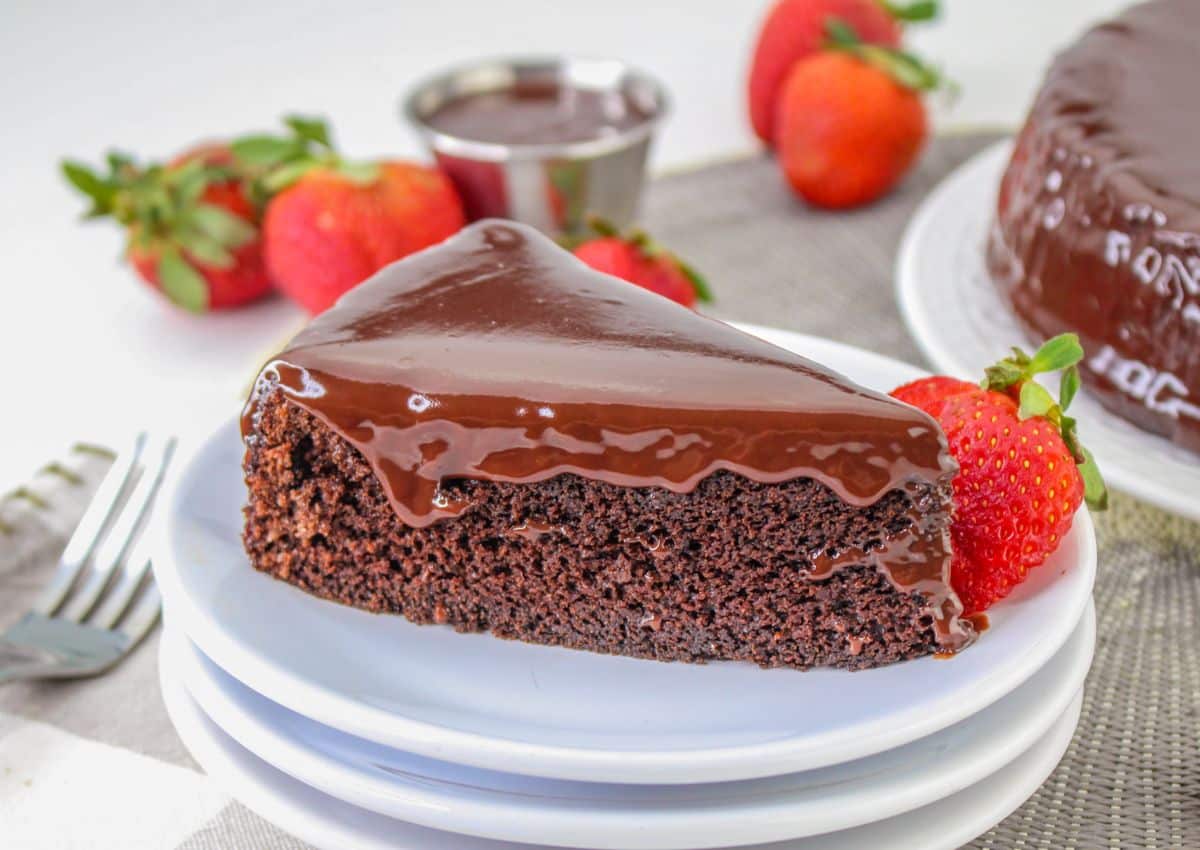 slice of double fudge cake on a small plate.