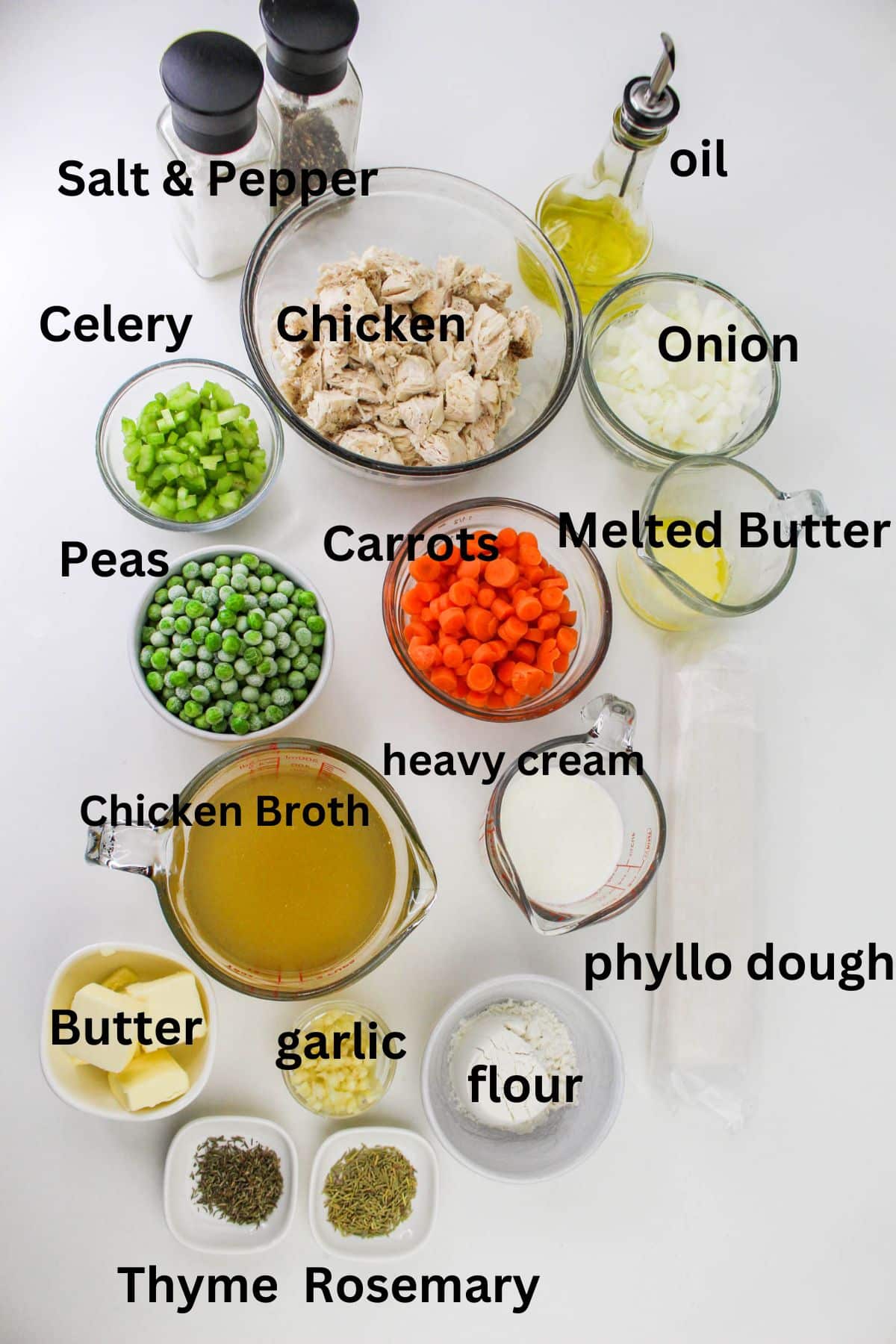 melt the butter, flour, heavy cream, phyllo dough, chicken, peas, chicken broth, carrots, onion, celery, oil, thyme, rosemary, salt, and pepper.