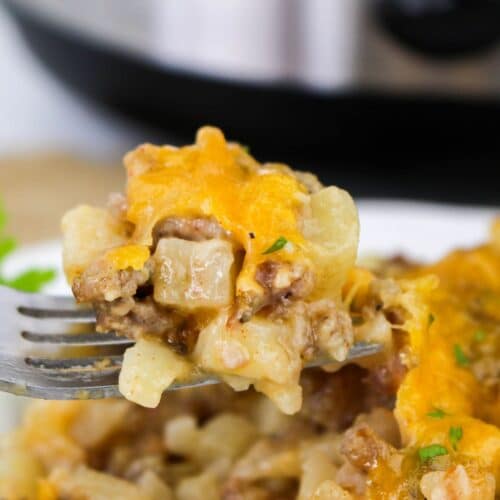 Slow Cooker Sausage Potato Casserole on fork