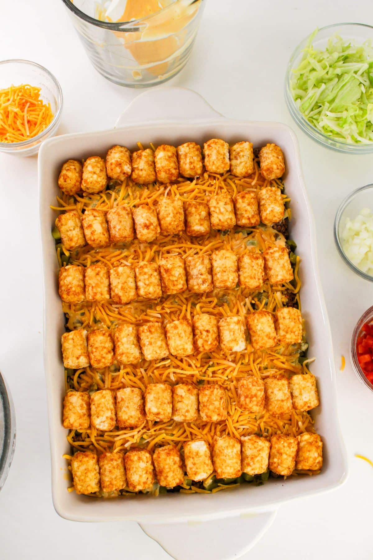 Tater tots on top of casserole.