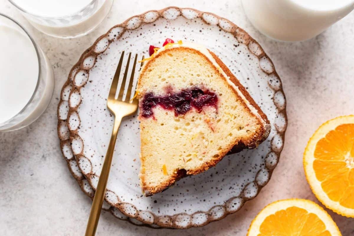 orange-vanilla pound cake with a tart cranberry filling throughout. The cake is topped with an orange glaze