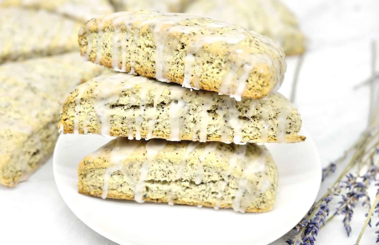 Earl Gray scones stacked on a white plate.
