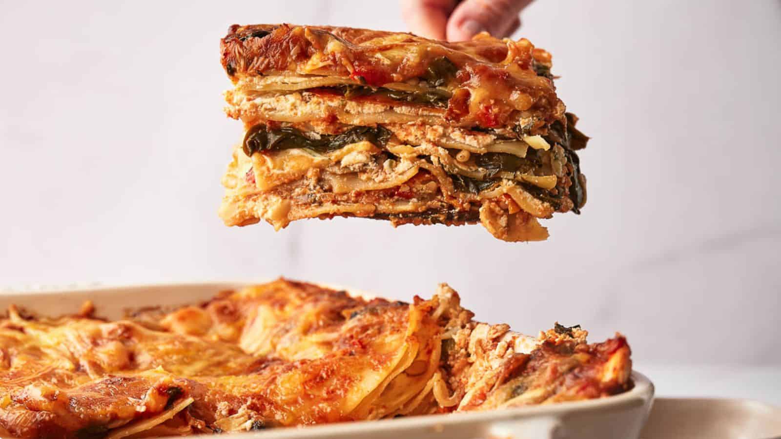 A lasagna being dished up.