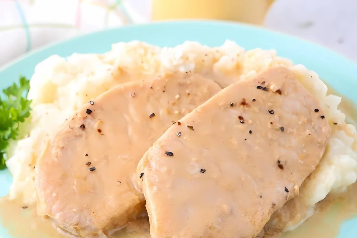 Tender pork chops slow-cooked with a savory sauce.