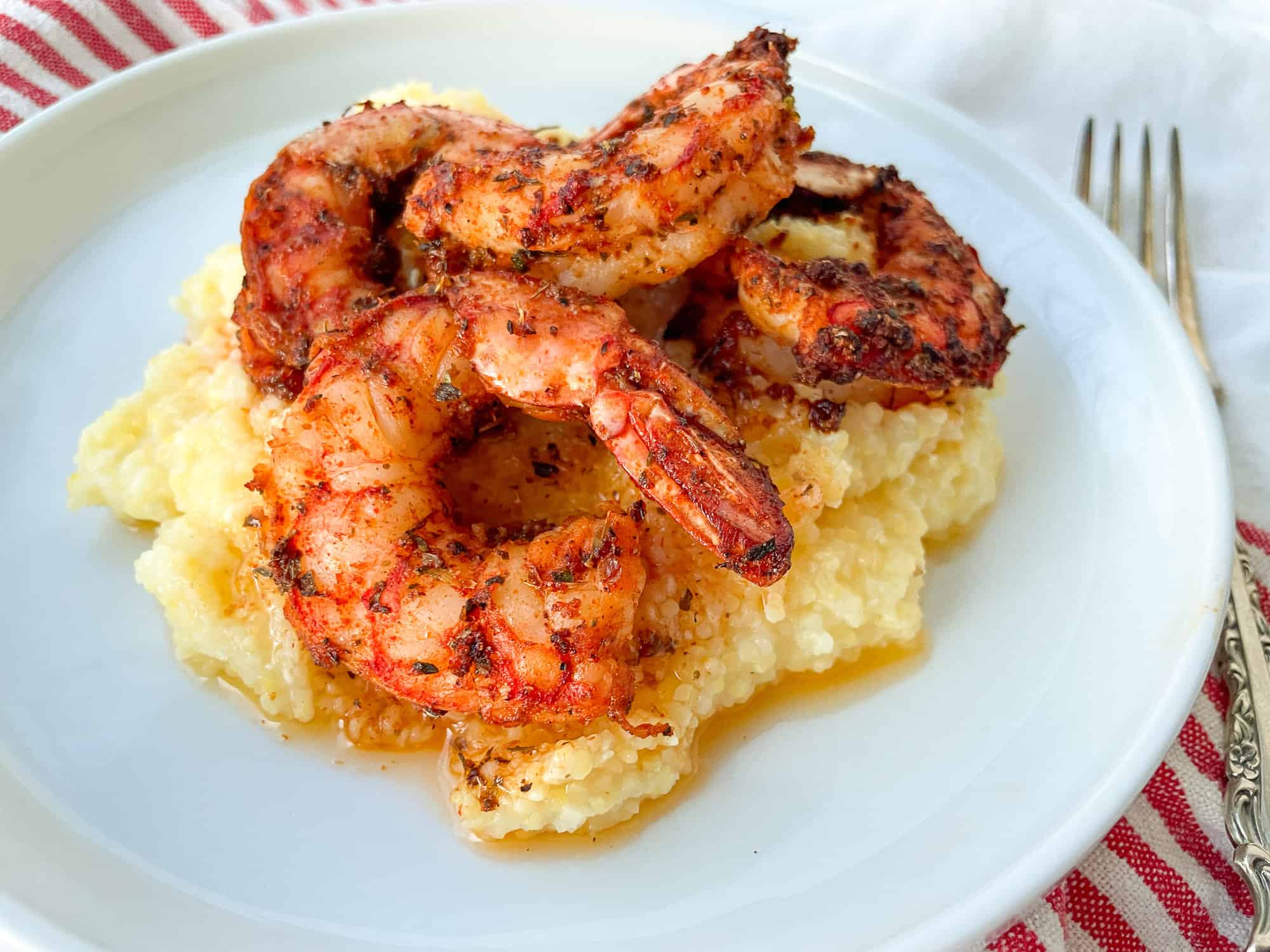 Air fried blackened shrimp in a plate.