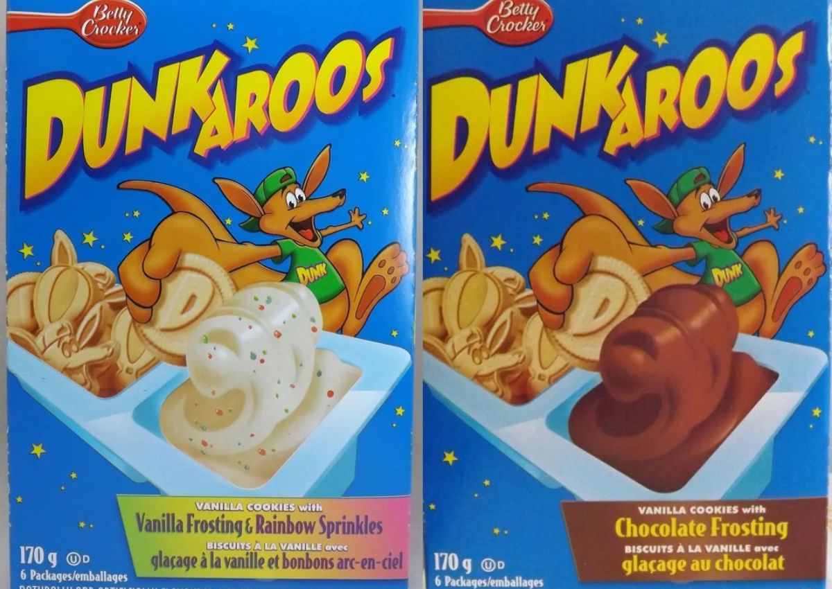 Two Dunkaroos boxes are shown: one with vanilla frosting and rainbow sprinkles, the other with chocolate frosting. Both feature a cartoon kangaroo holding a cookie.