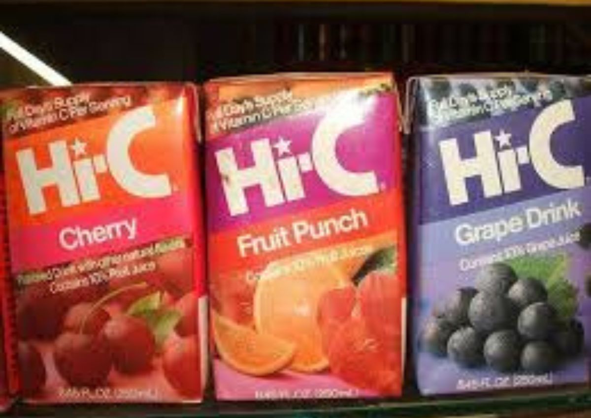 Three Hi-C juice boxes are shown side by side in cherry, fruit punch, and grape drink flavors. Each box displays images of the corresponding fruit.