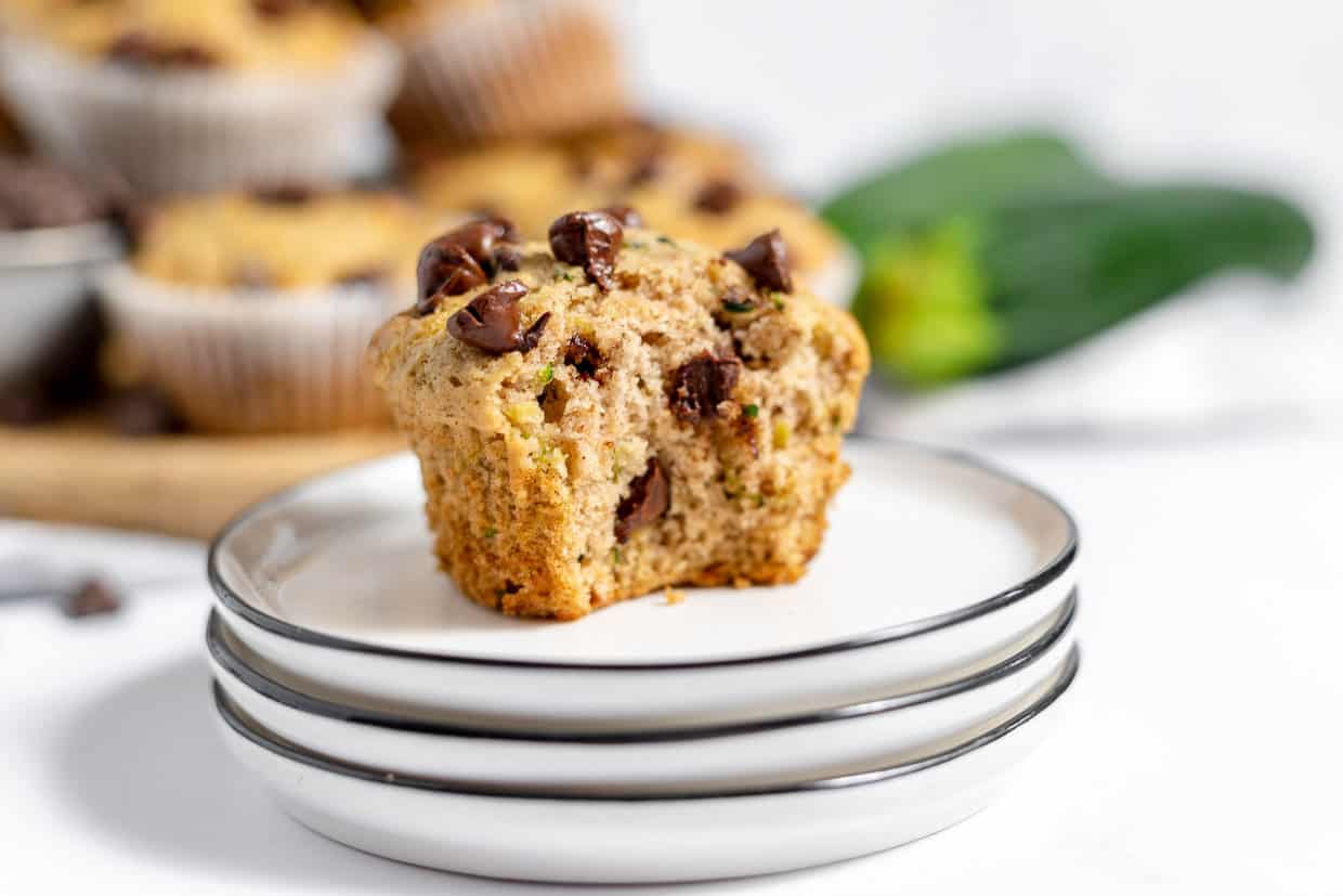 A muffin with a bite out of it.
