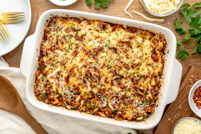 A casserole dish with cheese and meat.