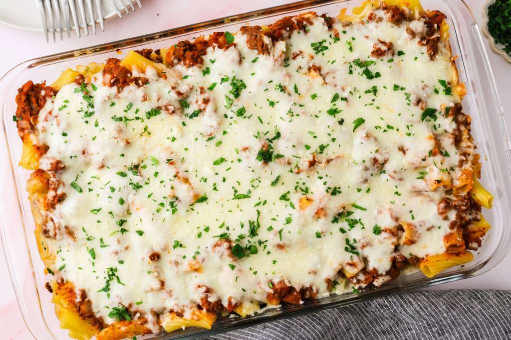 A casserole dish with cheese and meat.