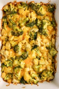 A Broccoli Chicken Potato Casserole featuring diced chicken, tender broccoli, potatoes, and melted cheese baked to perfection in a white dish.