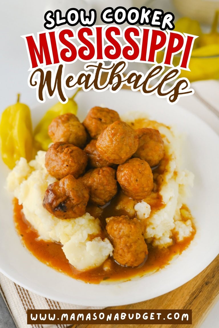 A plate of mashed potatoes topped with slow cooker meatballs in sauce, served with pepperoncini peppers on the side. Text reads Slow Cooker Mississippi Meatballs.